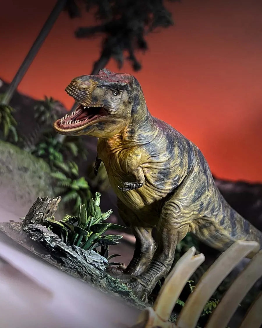 Painted Tyrannosaurus rex on a jungle table