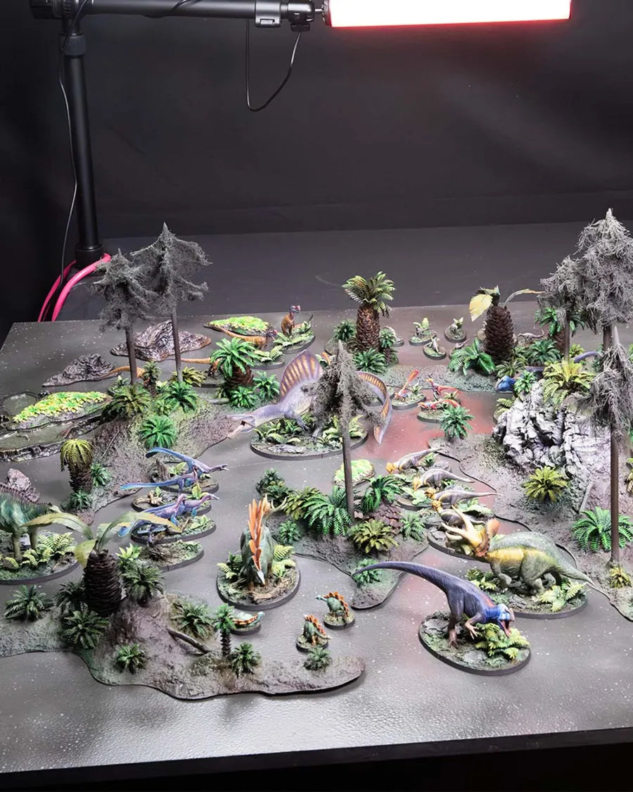 A painted CARNIVORE table being set up for a game